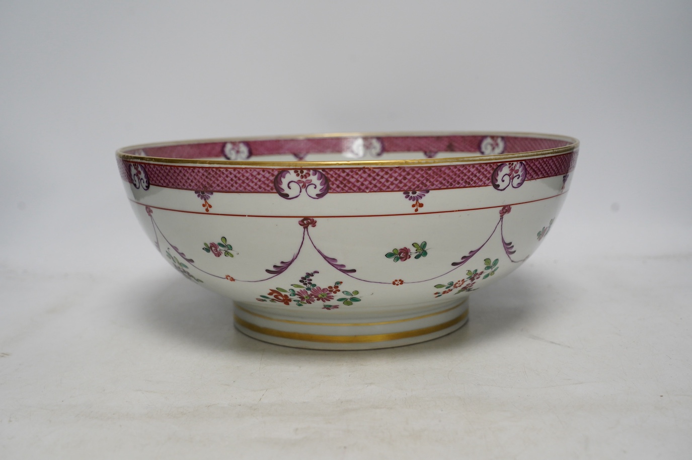 A 19th century Samson famille rose bowl, 32cm diameter. Condition - slight wear to gilding